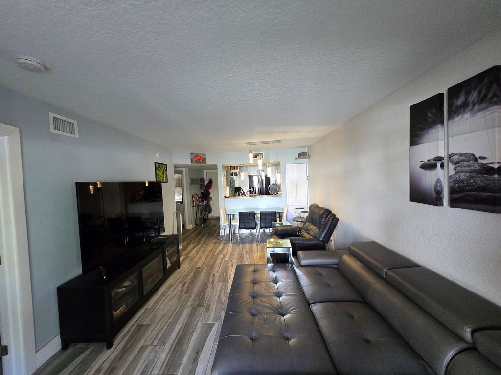 Photo of 1105 Lake Shore Drive #102, Lake Park, FL 33403 (MLS # R11156178)