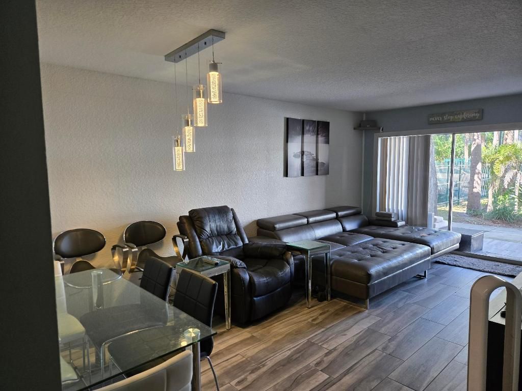 Photo of 1105 Lake Shore Drive #102, Lake Park, FL 33403 (MLS # R11156178)