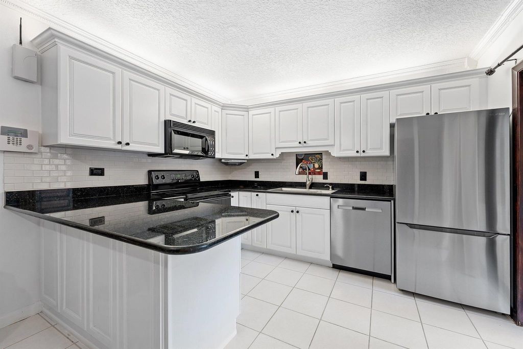 Photo of 1715 17th Lane, Palm Beach Gardens, FL 33418 (MLS # R11130012)