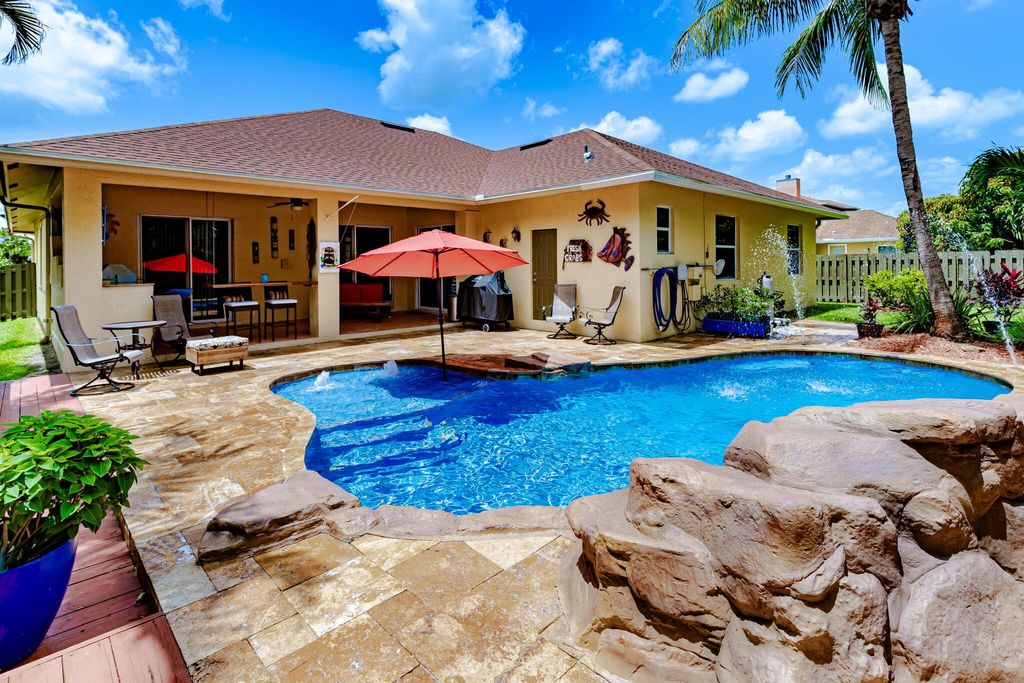 Photo of 473 SW Dagget Avenue, Port Saint Lucie, FL 34953 (MLS # R11096968)