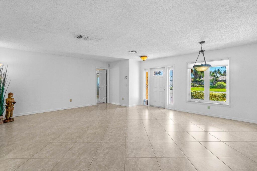Photo of 1011 NW 6th Street, Boca Raton, FL 33486 (MLS # R10955447)