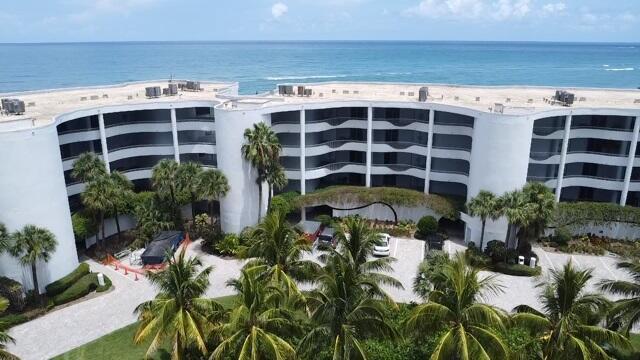 Breathtaking panoramic blue ocean views abound this first time ever on the market, prime location condo in the prestigious Sailfish Point Community. Experience resort style living on this luxurious island where once inside the gates your every need is fulfilled.This highly sought after 3 bedroom, 3 bath boasts turquoise waters from the expansive winding balcony offering an outdoor extension to the living space with amazing sunrises and views of the golf course & sunsets from the front, beach access, 2 under building parking spaces plus storage unit. Sailfish point offers fine dining at the oceanfront clubhouse as well as casual dining, Har Tru tennis courts, pickleball, Jack Niclaus'' signature'' golf course full service marina fully equipped fitness center and aquatics, spa,and heli pad