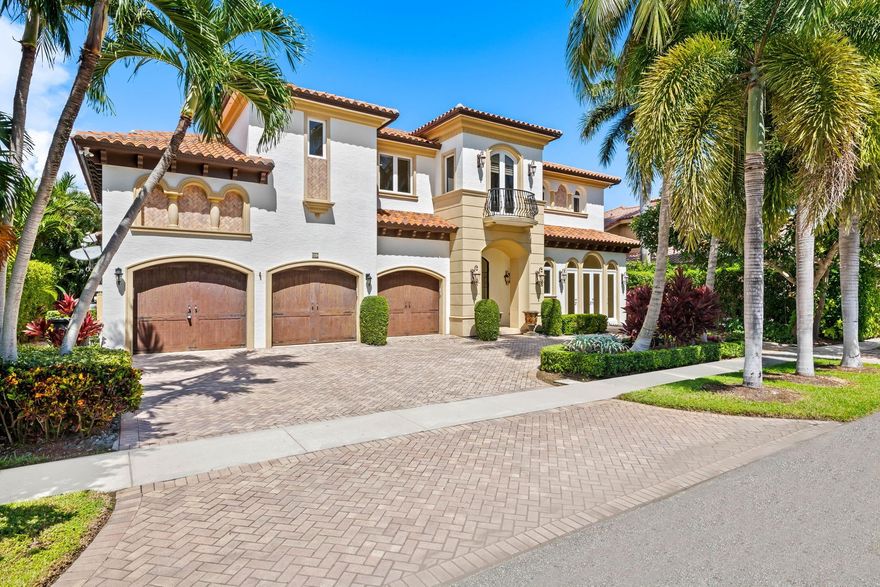 Experience timeless elegance in this Mediterranean-inspired estate, ideally situated on Tropic Isle's prestigious deepwater canal.  Offering 90 ft of prime waterfrontage with effortless access to the intracoastal, Lake Boca, and the Atlantic Ocean, this custom residence is designed for both grand entertaining and everyday luxury.  A dramatic foyer with soaring ceilings and a sweeping staircase introduces the home's refined interiors.  The expansive layout includes 5 en-suite bedrooms + office on first floor, 6 full baths + powder room, formal living and dining with chef's kitchen, and elevator access.  With hand-finished details, impact glass and elegant designs, this estate captures the essence of South Florida waterfront living, offering beauty, function, and a lifestyle beyond compare.