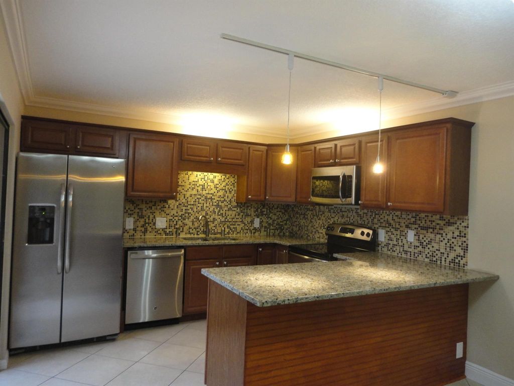 Photo of 3008 San Clara Drive #12-B, Delray Beach, FL 33445 (MLS # R10905083)