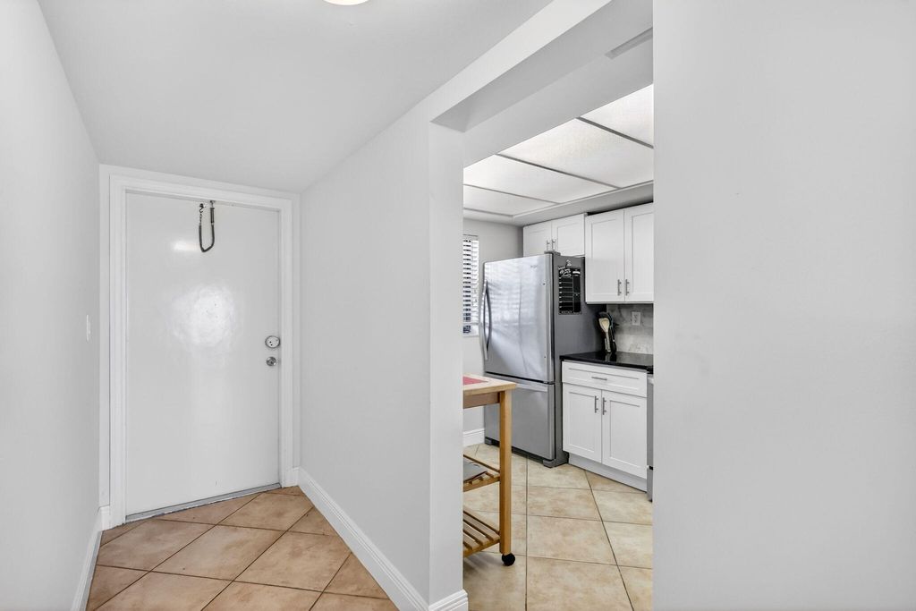 Photo of 10310 S Ocean Drive #107, Jensen Beach, FL 34957 (MLS # B26019017)