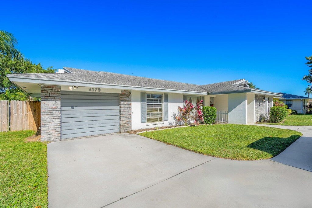 Photo of 4179 Hyacinth Circle, Palm Beach Gardens, FL 33410 (MLS # R10944806)