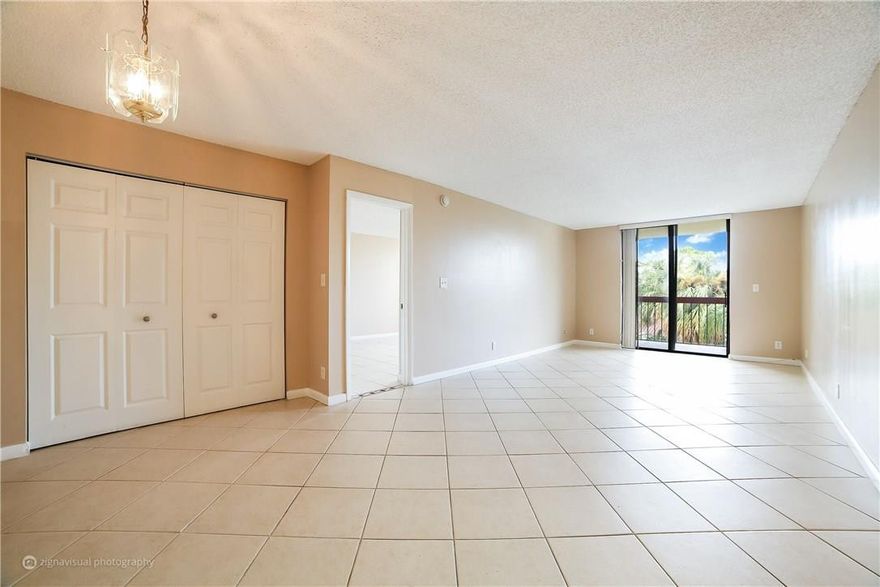 Quiet neighborhood, spacious, nicely maintained 2-bedroom corner unit, large balcony overlooking pool/garden. Medco key-secured building, one assigned parking space w/guest parking. Close to shopping, restaurants & neighboring Boca Raton.  Deerfield Bch/Atlantic Ocean with new retail/restaurants is approx. 5 minutes away.  New A/C unit approx. 2013, new W/D in unit 2014 and new water heater 2017.  Investors can rent out immediately. Water/Sewer included.  No commercial vehicles.  Cat OK (no dogs).  AS IS.