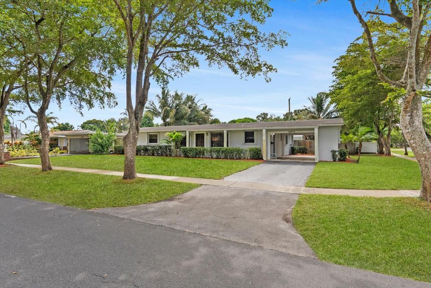 Welcome to this 3-bedroom, 2-bathroom pool home in the heart of Plantation! The Primary bedroom has a fully remolded bathroom and a walk-in closet. This inviting residence features spacious living areas, a cozy brick fireplace, and a relaxing screened-in pool with a hot tub—perfect for enjoying the Florida lifestyle year-round. The extra-large driveway and carport provide ample parking, and there is additional room for a large boat or RV behind the double gate. Nestled in a tranquil, established neighborhood with no HOA, this property offers both comfort and convenience. Ideally located near top restaurants, shopping, and entertainment, with easy access to Fort Lauderdale Airport, major highways, beautiful beaches, Broward Mall, and Sawgrass Mills Mall.