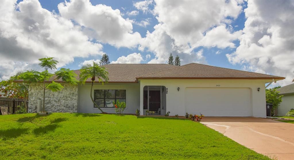 Photo of 2425 SE Marius Street, Port St Lucie, FL 34952 (MLS # R10870802)