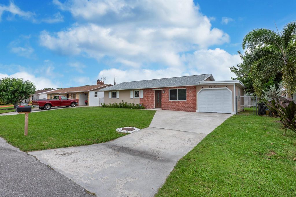 Photo of 4317 Applecrest Drive, Palm Beach Gardens, FL 33410 (MLS # R11112371)