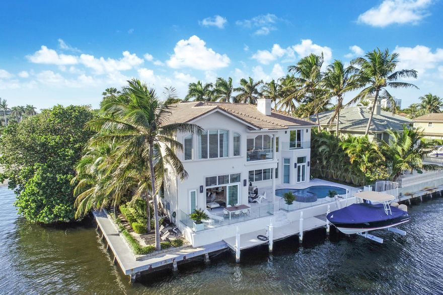 The Most Magnificent Intracoastal Property in all of Delray Beach. Situated on a Point cul-de-sac Lot with breathtaking water views in every direction. This Gated Estate is located in the prestigious enclave of Rio Del Rey Shores. Two minutes from downtown Delray. No Wake Zone, over 100 feet of Water Frontage and 80+ feet Private Dockage. Dock already equipped with Water, Shore Power, Lights, and 25,000 lbs Boat Lift. This 5 bedroom, 7 bathroom home has been magnificently renovated using only the finest quality materials and workmanship. Gourmet Kitchen with beautiful Quartz Countertops and Huge Center Island. Top of the line Miele Dishwasher, 6 burner Dacor Professional gas cooktop with griddle and side by side Dacor Ovens. Huge family room off the kitchen with 85 inch Sony Ultra HDTV. Formal Dining Room with 3 suspension lights by Moooi Raimond. Elegant Living Room with gas fireplace and beautiful views of the Intracoastal. Two en suite bedrooms downstairs, one with French Doors leading out to the pool & patio. Take the elevator to the second floor and you'll find an oversized loft with custom cabinets, wet bar, double drawer wine & beverage coolers. Flat screen TV and surround sound make this area another great place to relax and watch movies. Two additional guest bedrooms upstairs both en suite, one facing East with private balcony overlooking the beautiful Intracoastal. The Master Suite is absolutely amazing. Double door entry with floor-to-ceiling windows providing spectacular views of the Intracoastal. Huge His & Her's custom closets with built-in dressers, valet pull outs, belt and tie hooks. Morning Bar with double drawer vinotemp beverage cooler, sink, and custom cabinets. Master Bathroom is equally as impressive, custom Ultra Craft acrylux cabinets with under cabinet lighting, 2 Venini fixtures, glass bathtub, Starfire glass shower enclosure, Ronbow sinks, Graff faucets, Aquabrass rainshower with tower and hand held shower head. Separate His & Her's water closet, bidet, and full feature Toto toilet. New redesigned pool and spa/waterfall. New Italian Marble pool deck with glass railing. Additional home features include auto-on Kohler generator, triple pane hurricane glass, porcelain tile with glass overlay, 3 wet bars, 2 full size dual temp Allavino wine coolers, Clear View door screens, Control 4 smart house system, eco friendly Takagi recirculating hot water heater, plantation shutters, SOMFY electric shades in every room, little gourmet insta hot in kitchen, dog/cat shower in laundry room, Honeywell Central Vac, and 3 stop elevator...garage, first floor, and second floor. This home comes fully furnished along with TV'S, electronics, and window treatments.