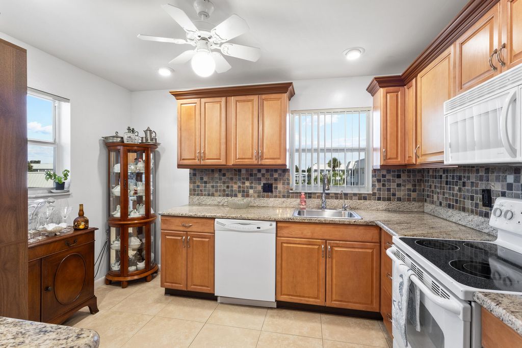 Photo of 7 Colonial Club Drive #300, Boynton Beach, FL 33435 (MLS # R11094312)
