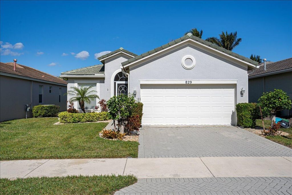 Photo of 829 SW Rocky Bayou Terrace, Port Saint Lucie, FL 34986 (MLS # R11055973)