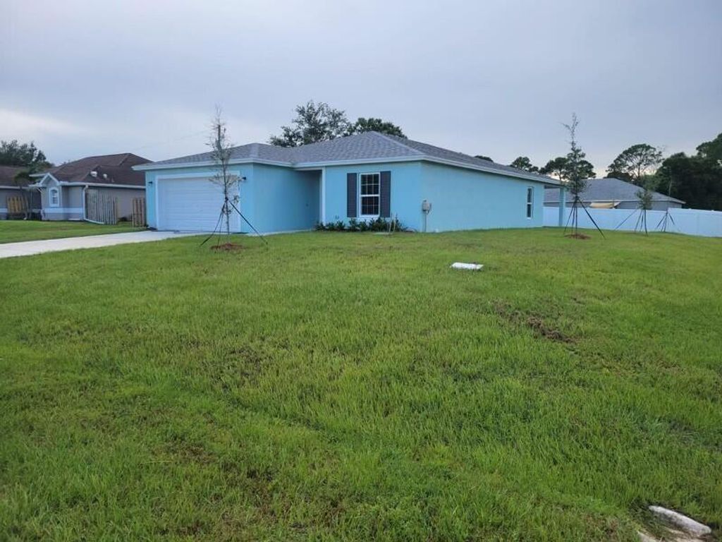 Photo of 1802 SW Davis Street, Port Saint Lucie, FL 34953 (MLS # R11003847)