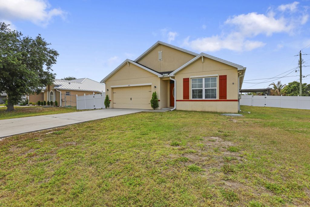 Photo of 275 SW Tulip Boulevard, Port Saint Lucie, FL 34953 (MLS # B26024156)