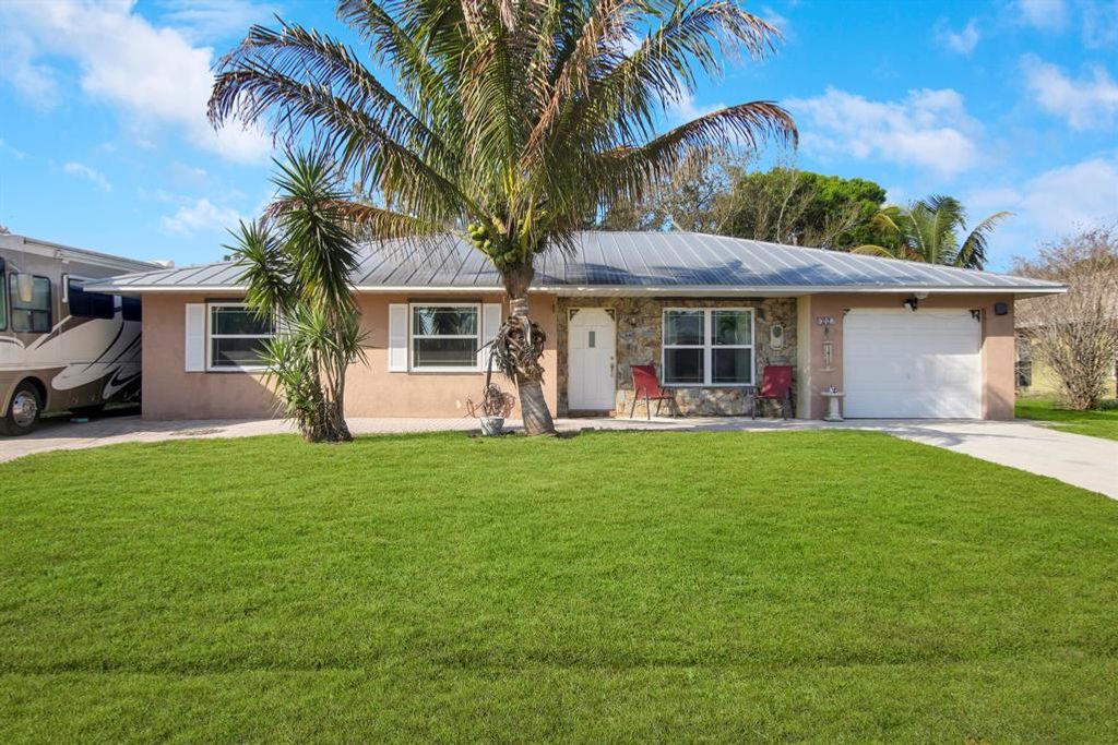 Photo of 642 NE Horizon Lane, Port St Lucie, FL 34983 (MLS # R10870541)