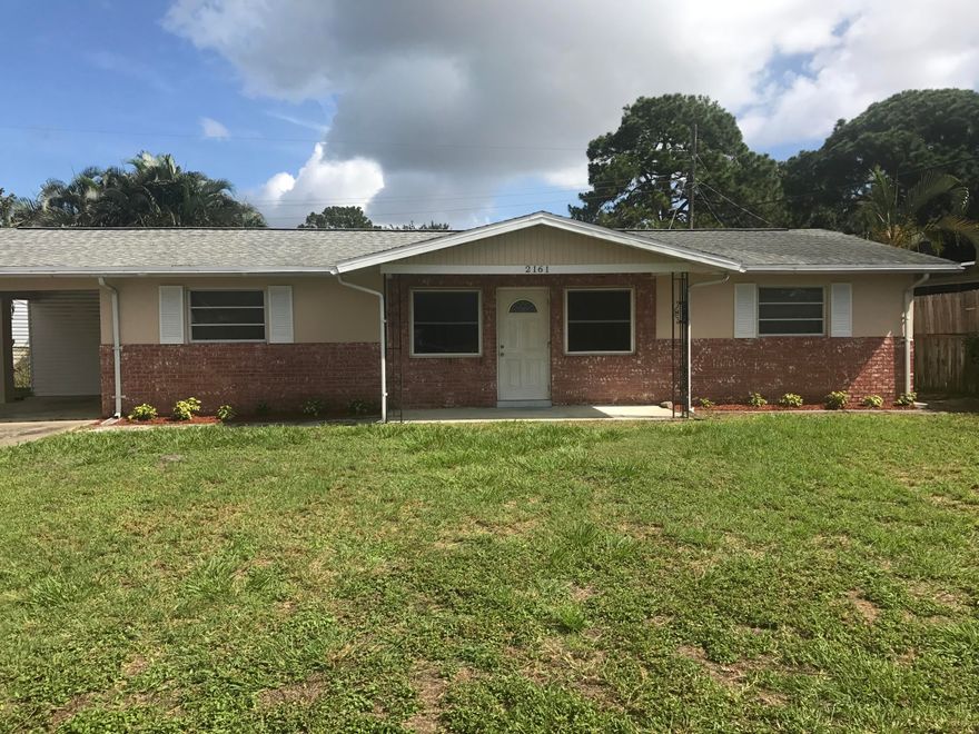 This home has tons of potential 3 bd 2 ba split floor plan home with Florida Room. Home has new carpet in the living area and new kitchen and bathroom flooring. Recently painted and landscaped this home just needs you to bring your own style.