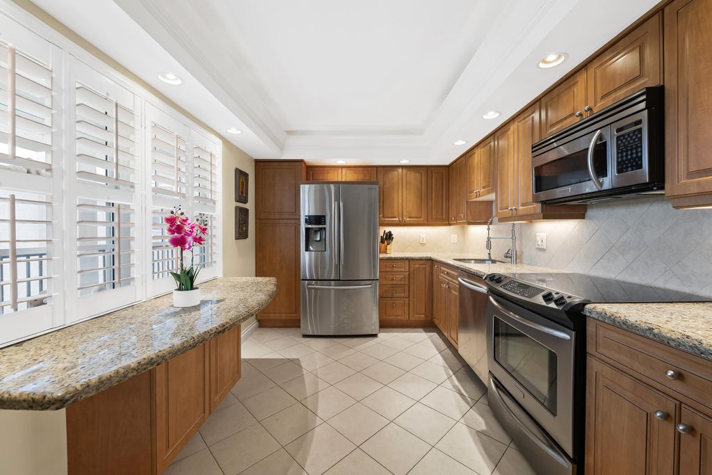 Photo of 2900 N Course Drive #909, Pompano Beach, FL 33069 (MLS # B26008513)