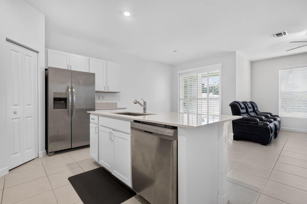 Photo of 4168 Lagoon Shore Drive, Lake Worth, FL 33467 (MLS # B26058828)