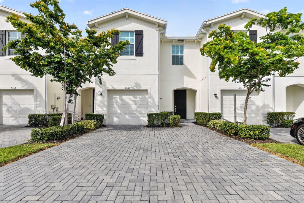 Photo of 4168 Lagoon Shore Drive, Lake Worth, FL 33467 (MLS # B26058828)