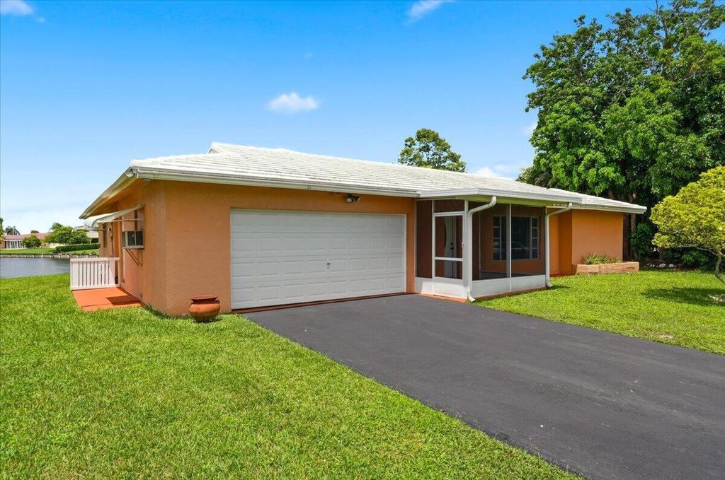 Photo of 9401 NW 70 Place, Tamarac, FL 33321 (MLS # B26052563)