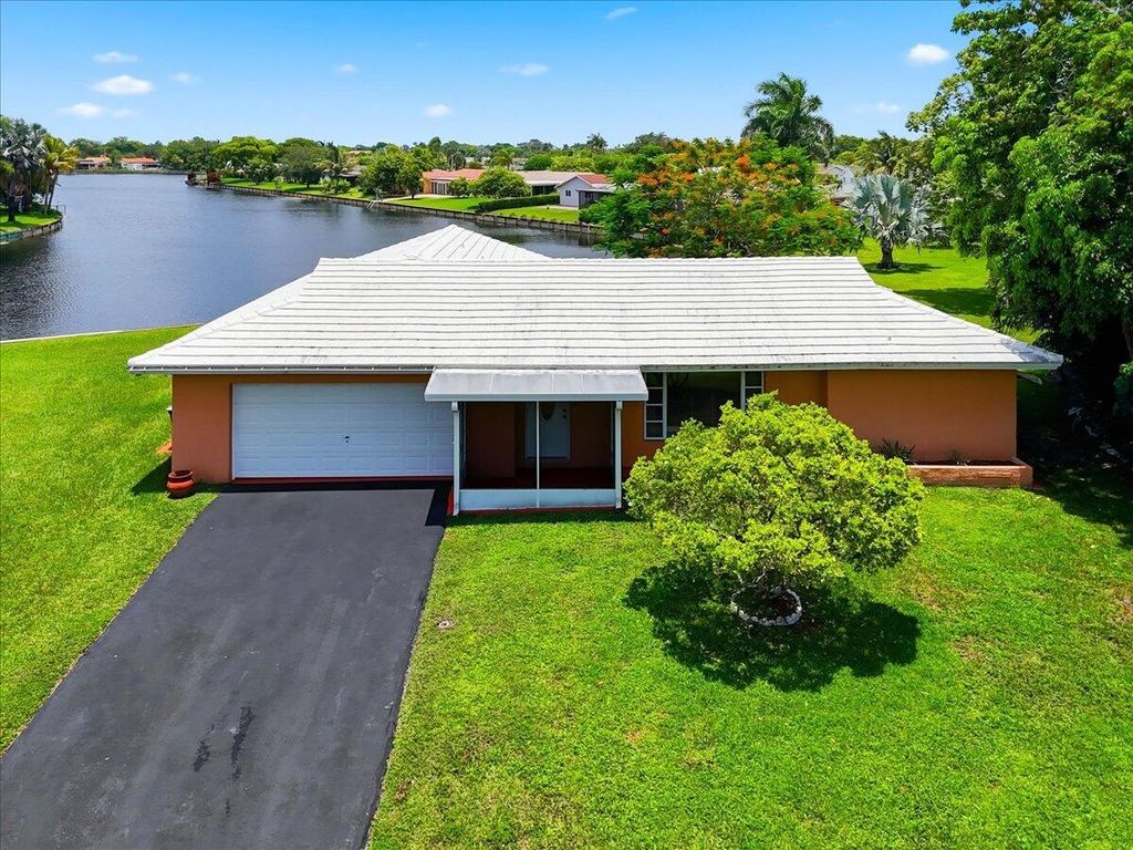 Photo of 9401 NW 70 Place, Tamarac, FL 33321 (MLS # B26052563)