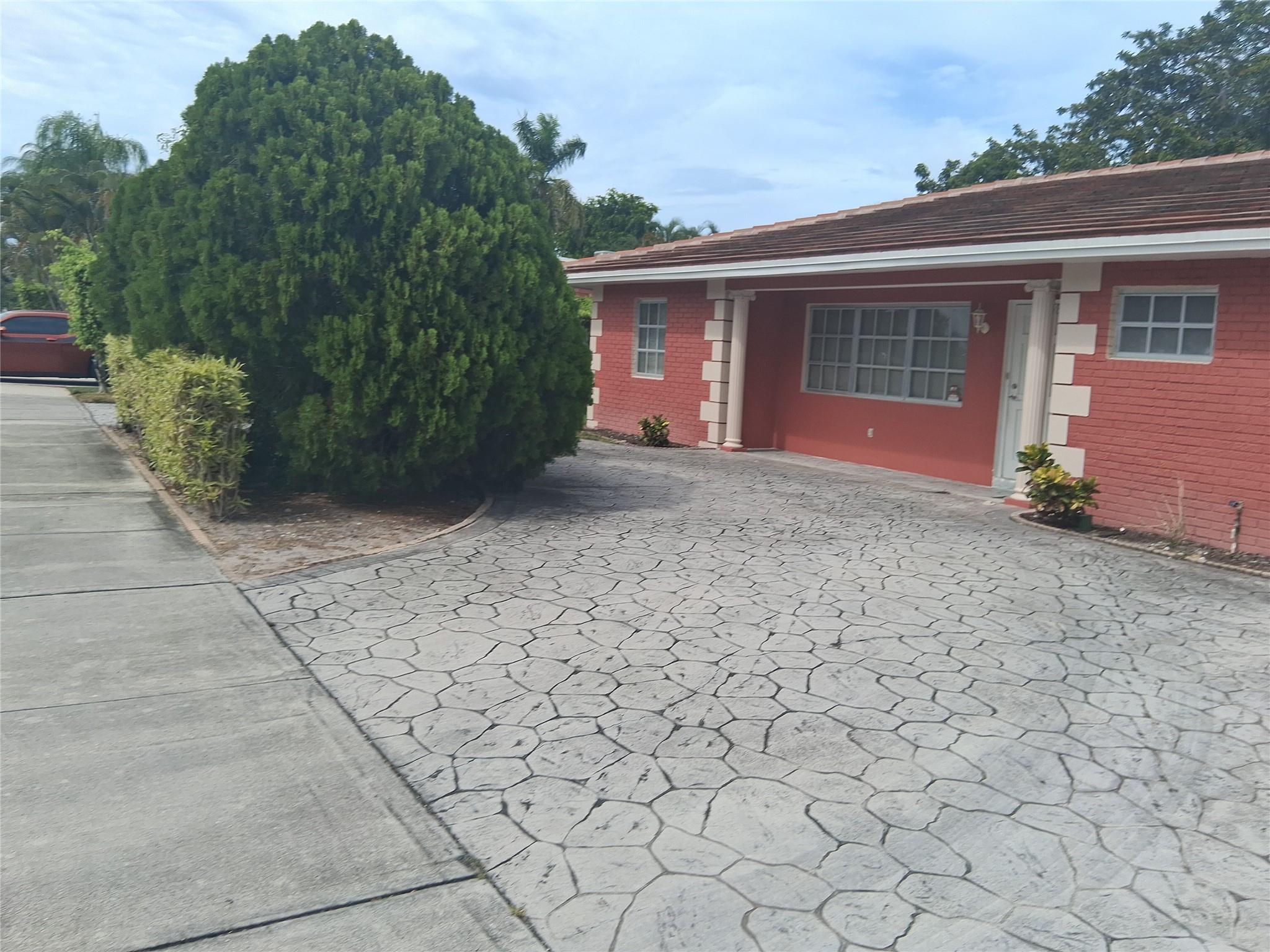 Located just minutes from the beach, pier, restaurants, & shops, this spacious home offers a wonderful blend of recent upgrades and potential for customization. Featuring wood-look tile flooring throughout, a generous living & dining area, & updated bathroom showers, this property is perfect for buyers looking to add their personal touch.
French doors lead out to a sparkling swimming pool and a large, fully fenced backyard — ideal for entertaining or relaxing in your own private oasis. The home also includes a separate laundry room, circular driveway, and a newer roof for added peace of mind.
Some renovations have already been completed, with room to finish & make this home truly your own. Don't miss this opportunity to own a property in one of Deerfield Beach’s most desirable locations.