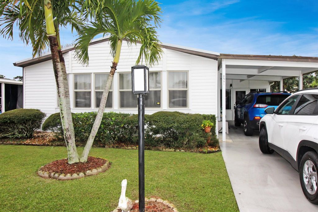 Photo of 8581 Mary Ann Lane, Port Saint Lucie, FL 34952 (MLS # R10947861)