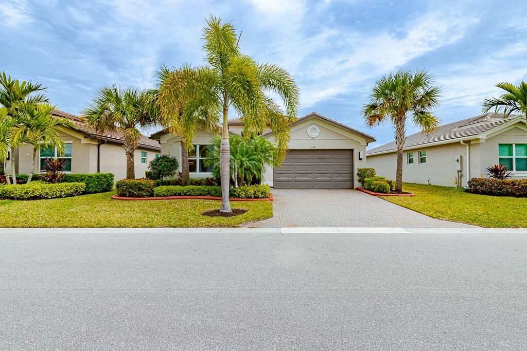 Photo of 11795 SW Hawthorne Hill Road, Port Saint Lucie, FL 34987 (MLS # R11054128)