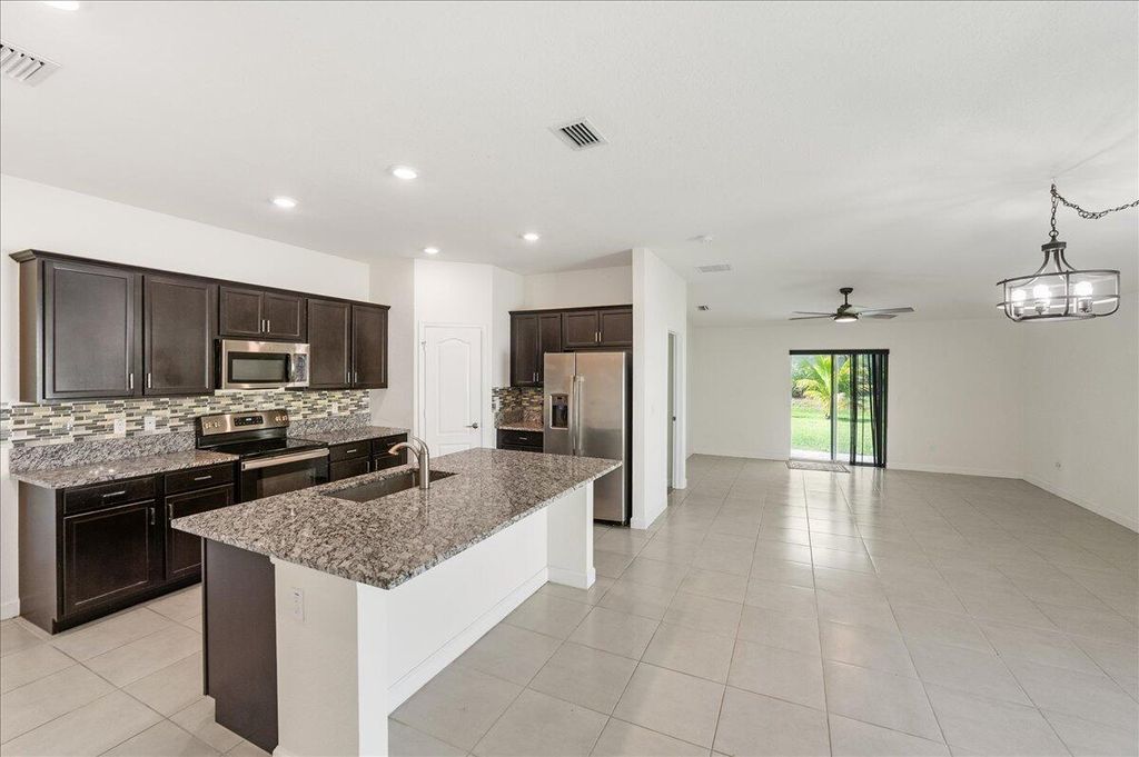 Photo of 900 Bent Creek Drive, Fort Pierce, FL 34947 (MLS # R11150108)