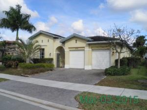 Highly Desirable 4BR/3BA Lakefront Home In Upscale Heron Bay! Fenced Pool, Marble Floors, Huge Fenced Patio Overlooking A Serene Lake View. This One Is A Must See! Hurry, This One Will Go Quickly!