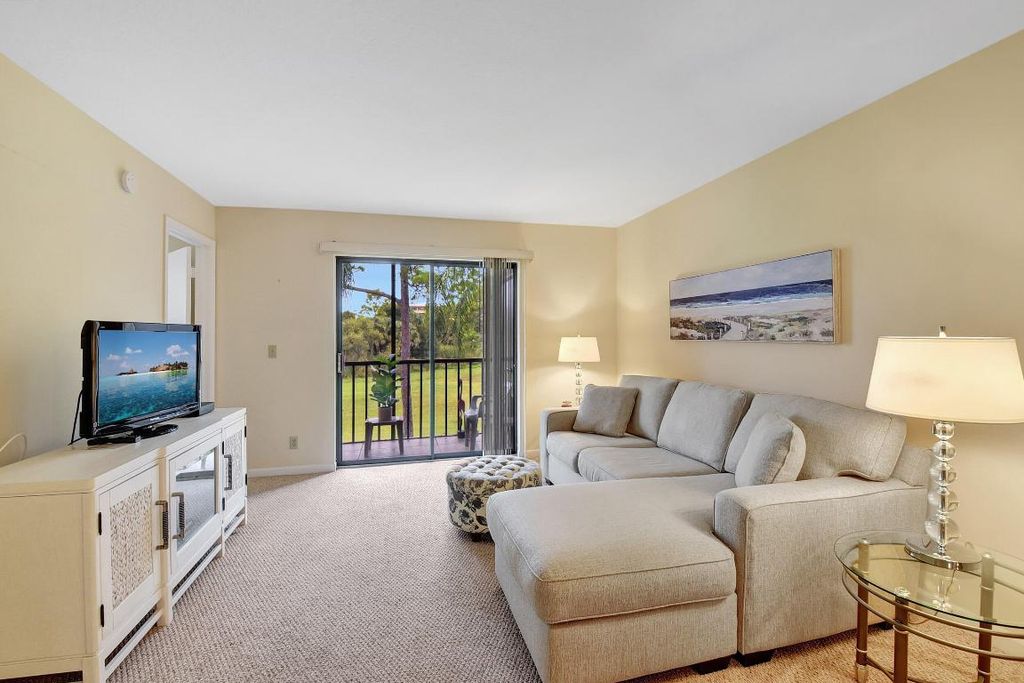 Photo of 7269 Golf Colony Court #205, Lake Worth, FL 33467 (MLS # R10985940)