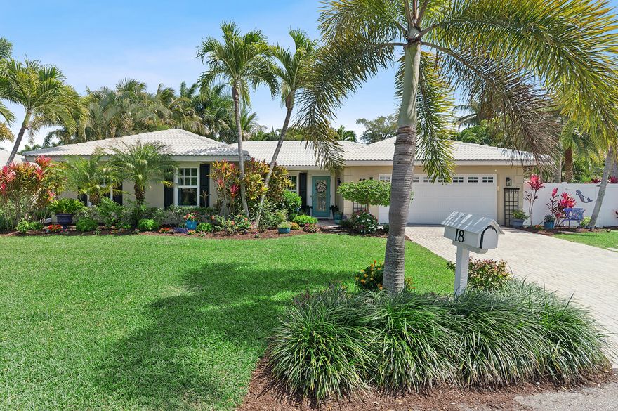 Nestled on a quiet cul-de-sac with a serene view of Lake Eden at the end of the street, this inviting home offers a rare blend of privacy, charm, and true move-in readiness. Surrounded by lush, tranquil landscaping, the property feels like a peaceful retreat while remaining close to everything. The expansive backyard and beautifully maintained side yard create a garden-like setting, perfect for relaxing, entertaining, or simply enjoying the outdoors. With mature greenery and generous space, the setting feels both serene and private, while the spacious side yard also offers excellent potential for a future home addition.   Inside, engineered hardwood floors and LED high-hat lighting create a clean, comfortable feel. The home's layout includes a formal living and dining area, a separate family room, and an eat-in kitchen, offering both openness and privacy. The highlight of the home upon entry is the idyllic view of paradise through stacking sliders in the formal living room, opening to a heated saltwater pool and a spacious covered patio to create a true indoor-outdoor living experience. The bedrooms are tucked away for added quiet and comfort. The updated kitchen is both stylish and functional, featuring marble countertops, stainless steel appliances, a double oven, wine bar, and pantry. A pass-through window connects to an outdoor snack bar and covered patio, while the kitchen flows seamlessly into the family room, perfect for everyday living and easy entertaining. The primary suite overlooks the pool and lush gardens and includes convenient cabana bath access, enhancing the home's relaxed indoor-outdoor lifestyle. A recently updated guest bathroom adds a fresh, modern touch. With major updates complete and a new roof currently being installed, this home is truly ready to enjoy from day one. Located just minutes from vibrant downtown Atlantic Avenue and close to Delray Beach's shoreline, this home offers a lifestyle defined by comfort, convenience, and everyday charm.