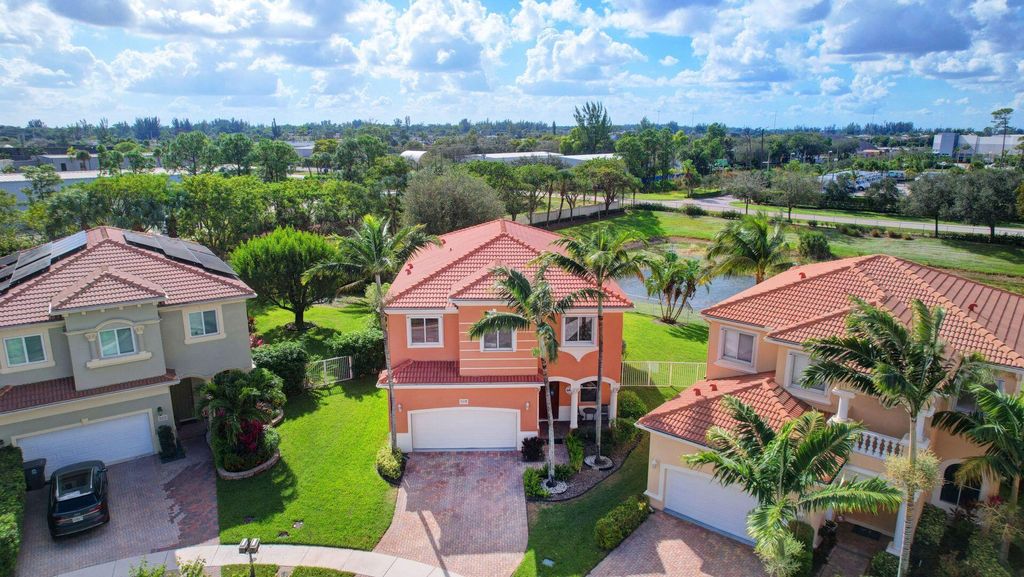 Photo of 559 Gazetta Way, West Palm Beach, FL 33413 (MLS # R10938147)