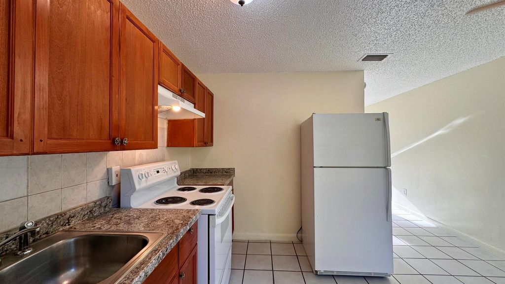 Photo of 4909 Gulfstream Road, Lake Worth, FL 33461 (MLS # R11006253)