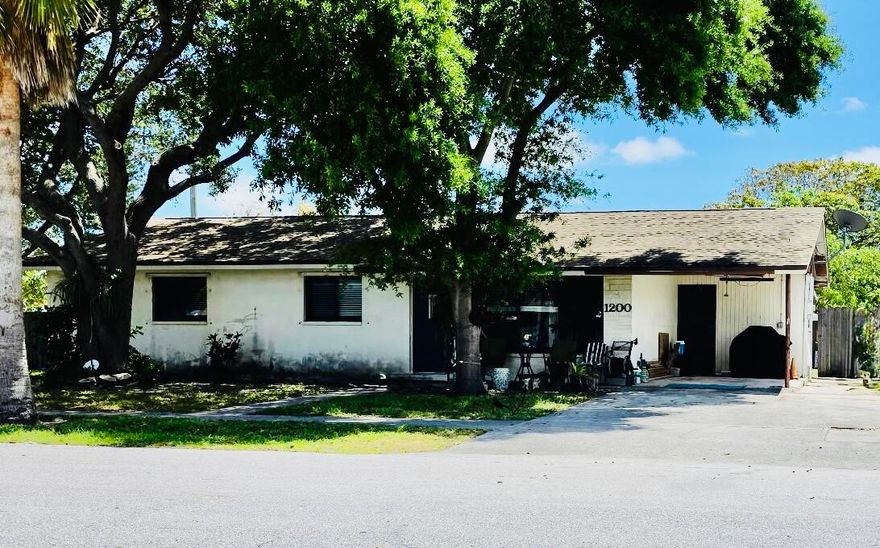 Opportunity knocks just blocks from the Intracoastal and minutes to the beach!   This 3-bedroom, 2-bath home sits on a large corner lot in a highly desirable Lantana neighborhood with NO HOA—a rare find this close to the water.   Property requires repairs/updates and is being sold in as-is condition. Suitable for investors or buyers seeking to create their dream coastal retreat. This property offers potential for redesign, outdoor living upgrades, or future improvements like addition to increase square footage and maximize returns.  Bring your vision and unlock the full potential of this property - and plenty of room for a pool if desired.   Conveniently located near local restaurants, shopping, and coastal amenities.   Priced to reflect current condition.