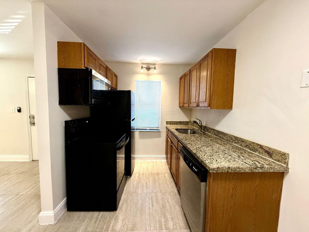 Photo of 607 NE 29th Drive #22, Wilton Manors, FL 33334 (MLS # B26045441)