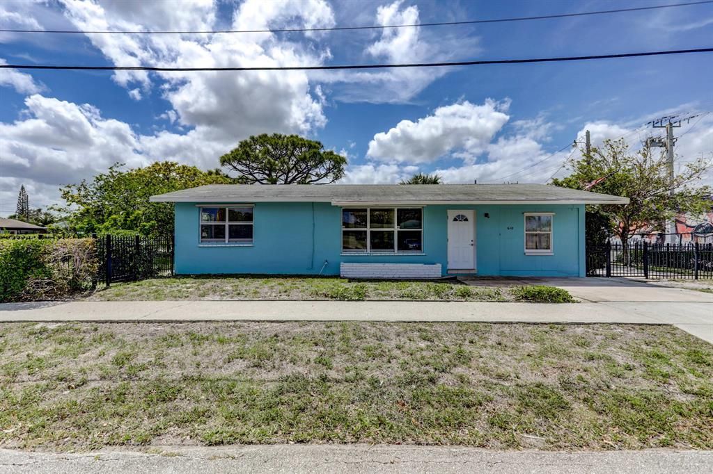 Photo of 610 7th Street, Lake Park, FL 33403 (MLS # R10711590)
