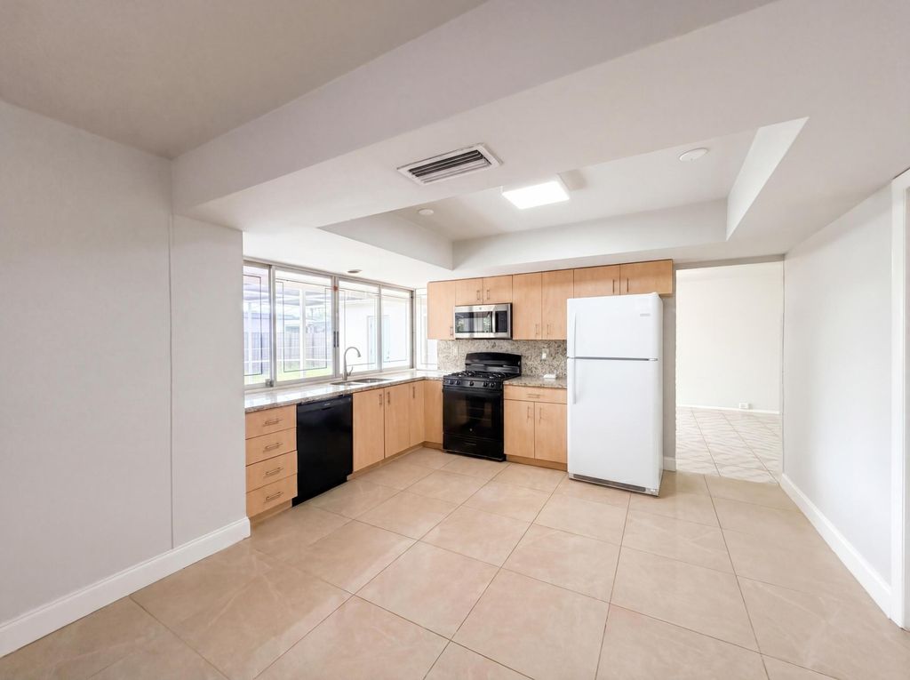 Photo of 7141 Harbour Boulevard, Miramar, FL 33023 (MLS # B26044157)