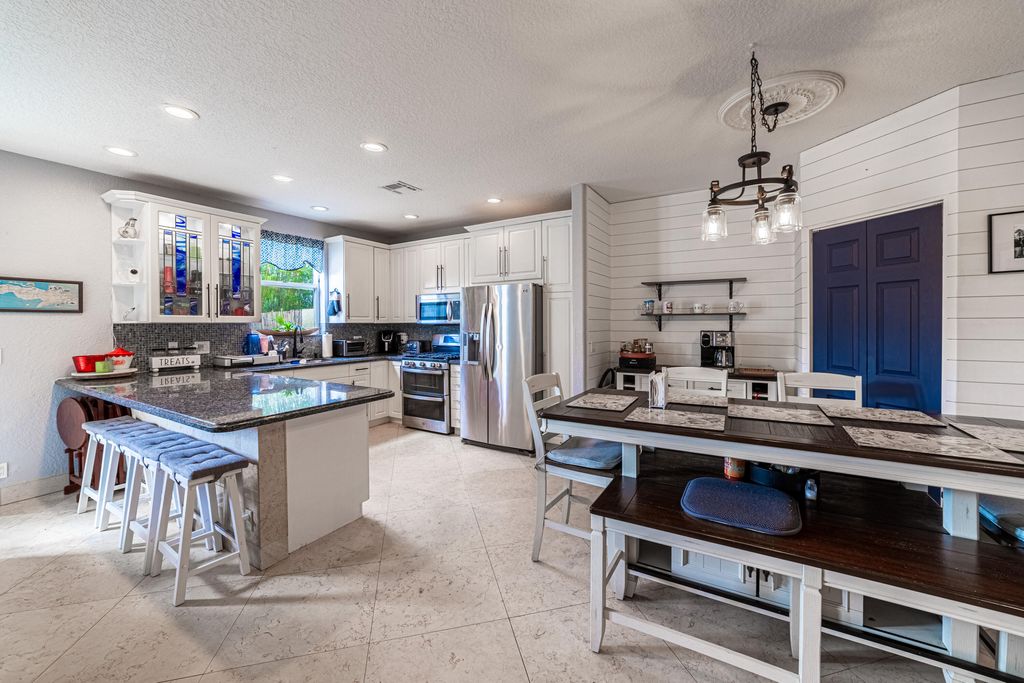 Photo of 136 Spruce Street, Boynton Beach, FL 33426 (MLS # R10974003)