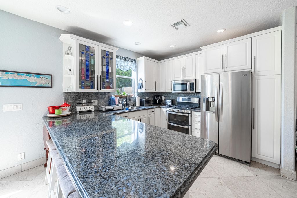 Photo of 136 Spruce Street, Boynton Beach, FL 33426 (MLS # R10974003)