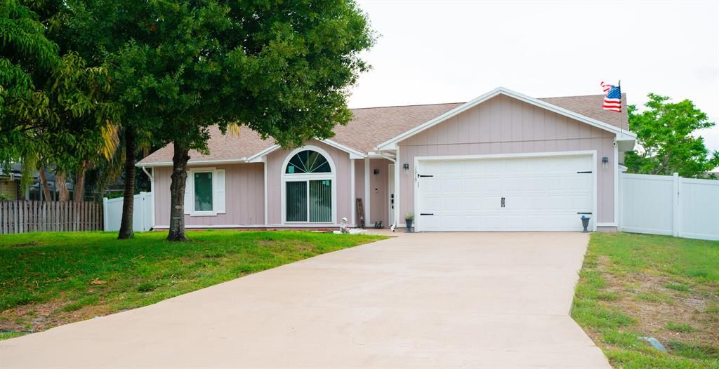 Photo of 1319 SE Naples Lane Ln, Port St Lucie, FL 34983 (MLS # R10798307)