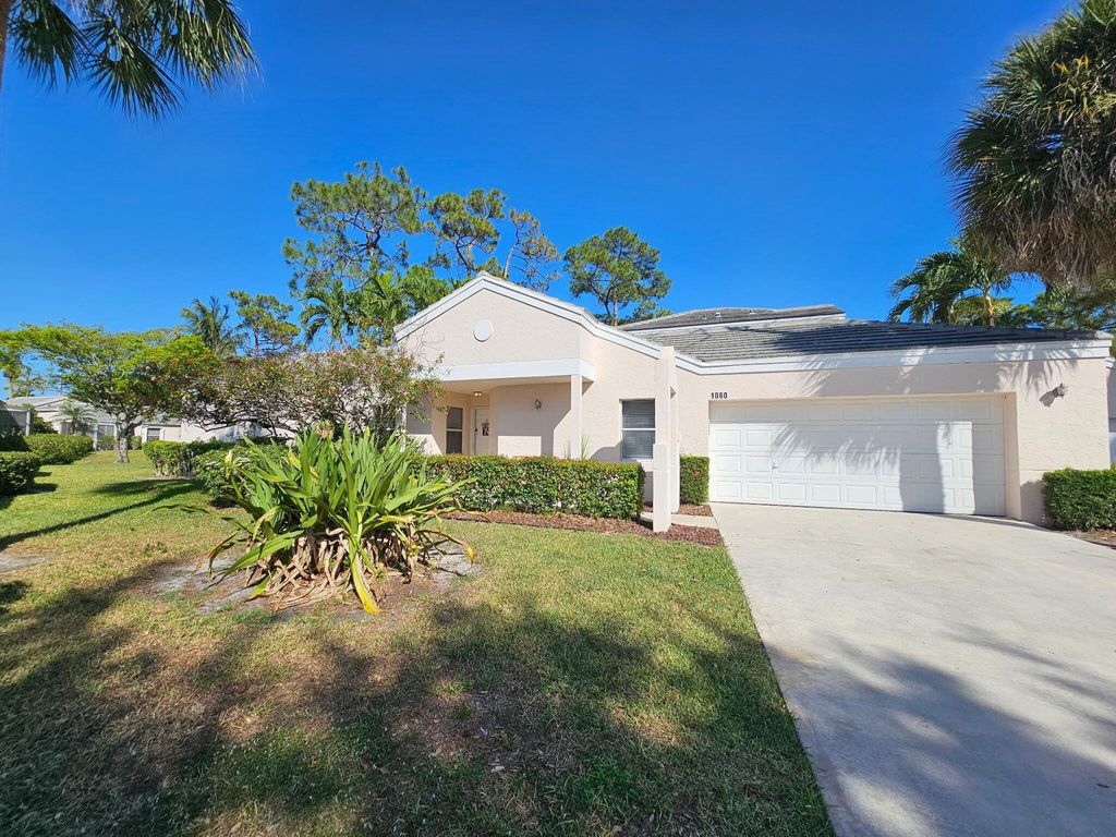 Photo of 1060 Island Manor Drive, Greenacres, FL 33413 (MLS # R11080088)