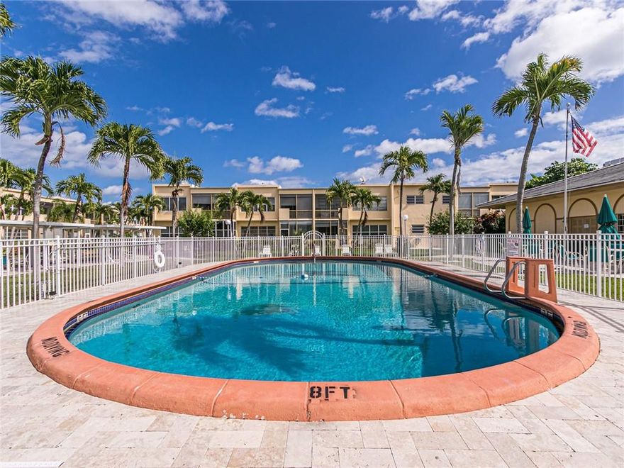 All ages & pet friendly! Move Right-in! Fantastic ground floor unit remodeled with permit in 2014 . This spacious unit (1071 S.F) is very well maintained. Enjoy the view of the the wonderful, manicured gardens from your private patio. This unit offers a remodeled kitchen with new cabinets, glass backsplash, quartz countertop, brand new S.S. appliances & recessed lighting.  New A/C (December 2021). Thankless water heater. New electric panel. Double protection, impact windows and doors + accordions shutters. Gorgeous bathrooms remodeled.  Free wi-fi at the pool. Seasonal or annual rentals allowed after 2 years. One cat or dog allowed, max: 15 pounds. Amenities included Clubhouse, heated pool, spa, shuffleboard & BBQ area. Walk to shops, 1 mile from the beach! WOW!