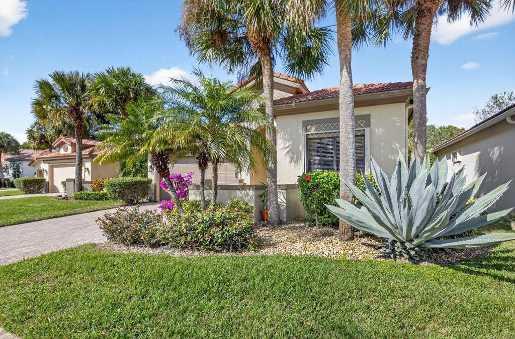 Photo of 9804 Isles Cay Drive, Delray Beach, FL 33446 (MLS # R11152789)