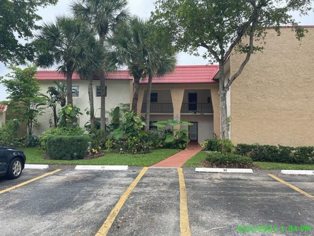 Photo of 154 Lake Evelyn Drive Dr, West Palm Beach, FL 33411 (MLS # R10728210)