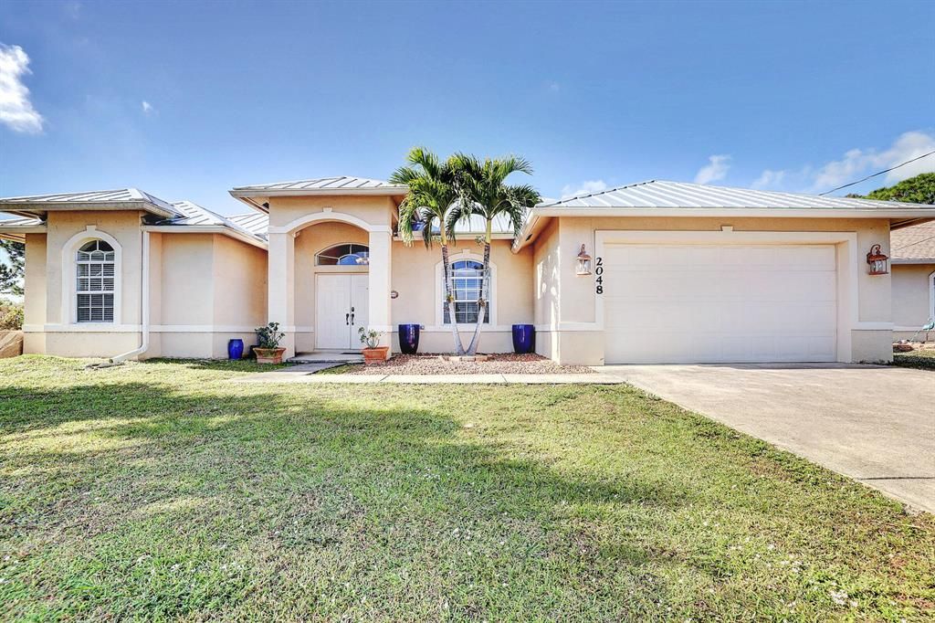Photo of 2048 SW Savage Boulevard, Port Saint Lucie, FL 34953 (MLS # R10764829)