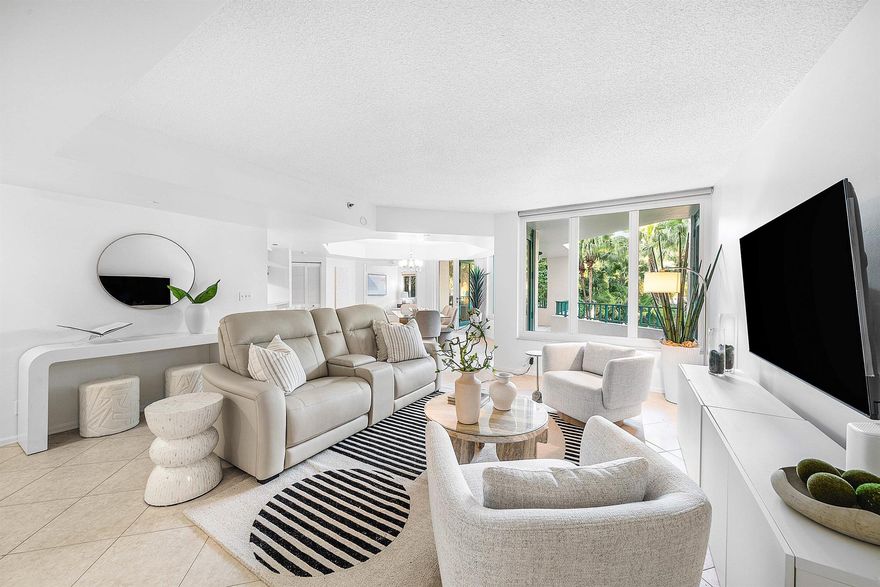 Indulge in refined coastal living at Mizner Court, an exclusive waterfront enclave set within the prestigious grounds of the world-renowned Boca Raton Resort & Club. Spanning 13 acres of lushly landscaped luxury, this private community offers views of the Intracoastal Waterway & Lake Boca. This expansive 2-bedroom, 2-bath residence features a split floor plan, an oversized covered balcony, and tranquil garden vistas, presenting an exceptional opportunity to create a bespoke retreat. Steps from the beach, premier dining, and upscale shopping, Mizner Court delivers effortless resort-style living. Residents enjoy an array of five-star amenities, including two waterfront pools, a state-of-the-art fitness center, elegant club and billiards room all within an impeccably maintained setting.