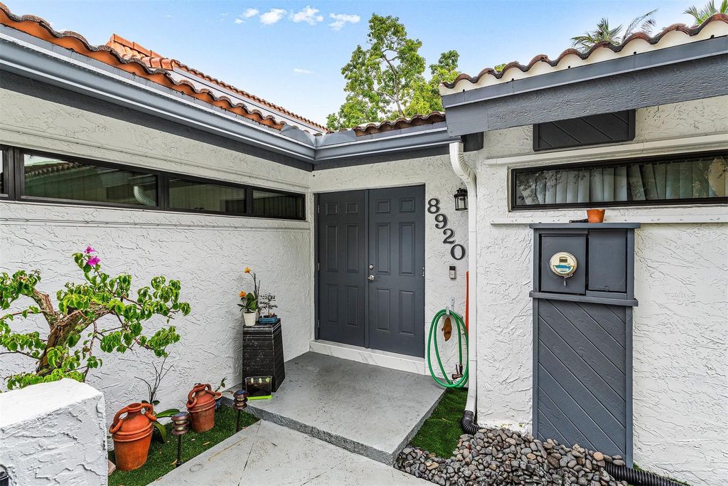 Photo of 8920 Jacaranda Lane, Plantation, FL 33324 (MLS # F10523233)