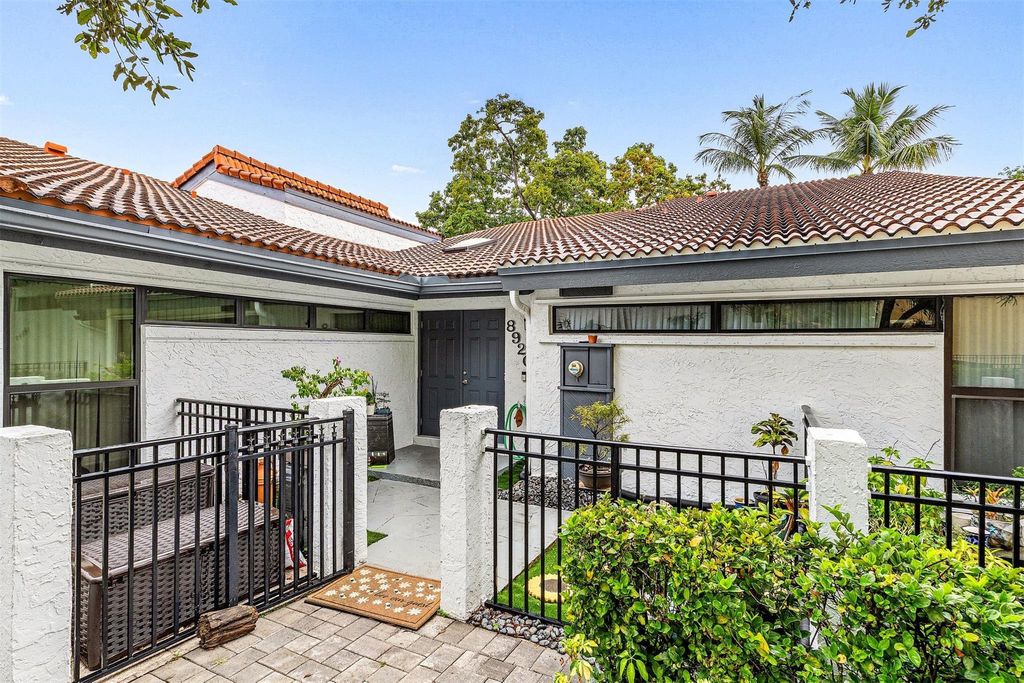 Photo of 8920 Jacaranda Lane, Plantation, FL 33324 (MLS # F10523233)